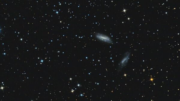 Спиральные галактики NGC 672 и IC 1727 в созвездии Треугольника